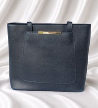 Eisela midnight blue women's structured tote bag with large front pocket, shoulder handles and gold-tone accent.