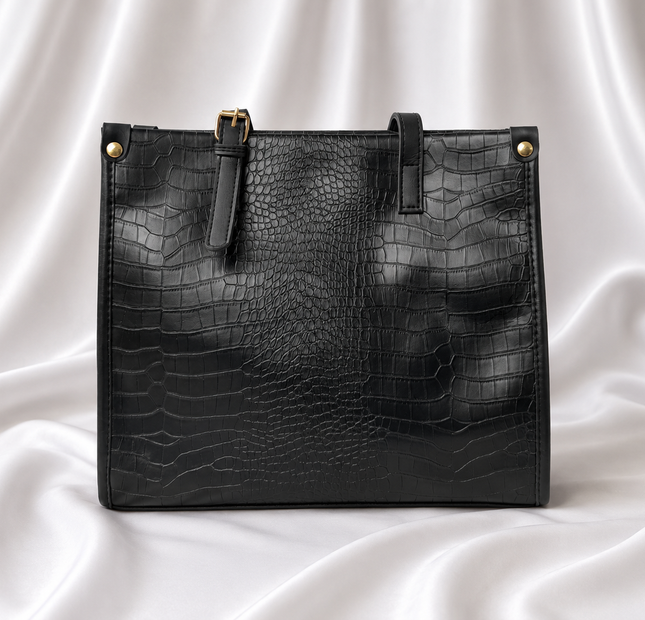 Luxury black crocodile-embossed women's tote bag with gold-tone hardware by Eisela.